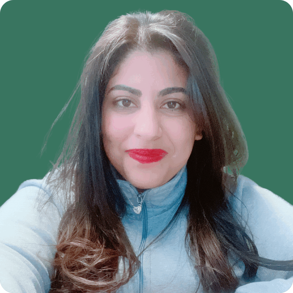 Profile photo of Shahd smiling, on a solid dark green background.