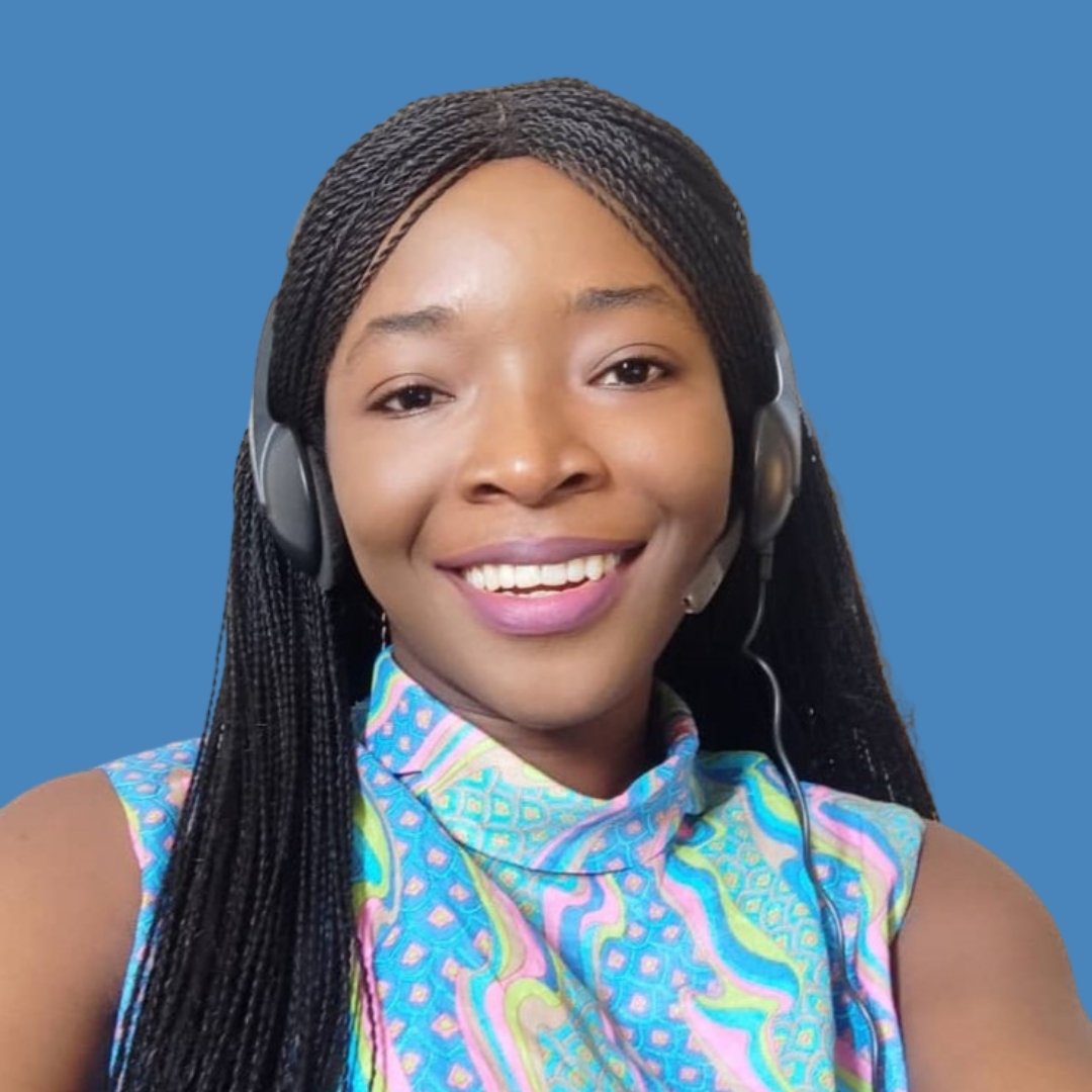 Smiling woman wearing a headset against a blue background